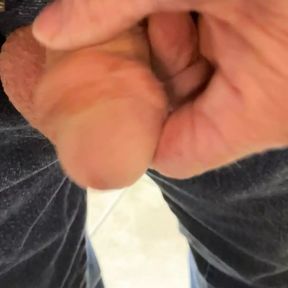 Stroking soft cock