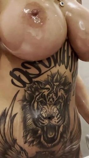Tattooed MILF Tyra Shows Oiled Tits and Wet Pussy