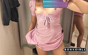 In the fitting room of H&M I touch my small Tits and pussy