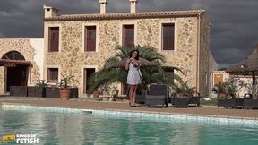 tattooed babe plays with her pussy and fucks with a big toy outside on the sunbed