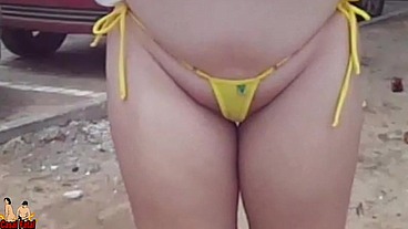 Naughty wife goes to the beach with a micro bikini. She teases her cuckold!