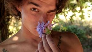 Muscular guy with a pretty face masturbates outdoors and it’s hot