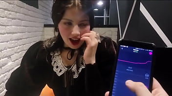 Girl gets teased with Ohmibod at restaurant