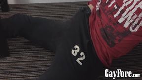 Young twink with abs jerks himself off hard for the camera