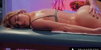 Blonde bombshell Shiri Allwood and Jean Hollywood dominate submissive Kenzie Anne in sultry oil massage