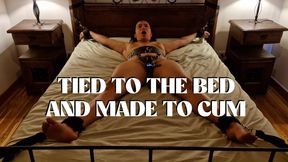 Tied to the bed and made to cum