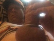 Stroking wearing cockrings.