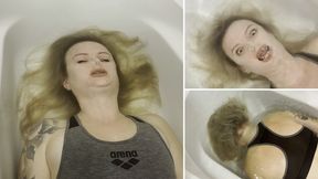 Anastasia struggle to hold her breath underwater