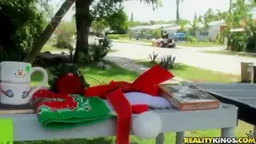 A Latina MILF is seduced at some yard sale