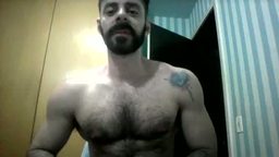 Hairy Muscular Bear Shows Off Body