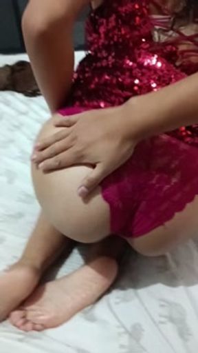 Sexy best friend trying on a red dress for a birthday party...