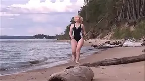 Charging at sea with a blonde stunner in beachwear