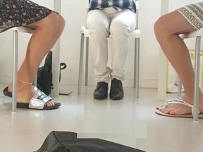 Teachers playing with their feet in staffroom