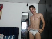 young man dancing sexually in his room