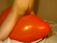 Big inflatable orange balloon humping cum