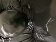 RUBBER GIMP GIVING ORAL TO RUBBER COCK