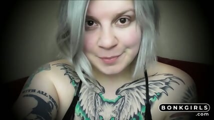 Close up fingering by a busty webcam model