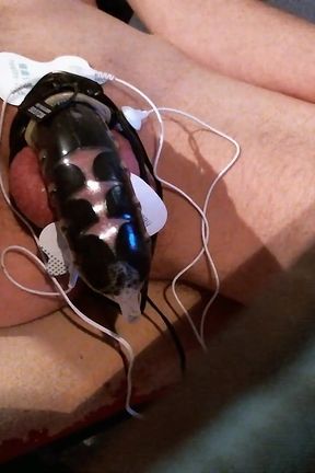 Trying e-stimm in chastity