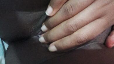 Amateur ebony masturbation gets louder while almost getting caught squirts on friend’s bed