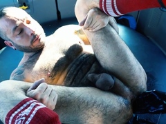 Tattooed hunk in gloves fisting stud ass