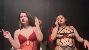 2 sexy girls smoking cigarette