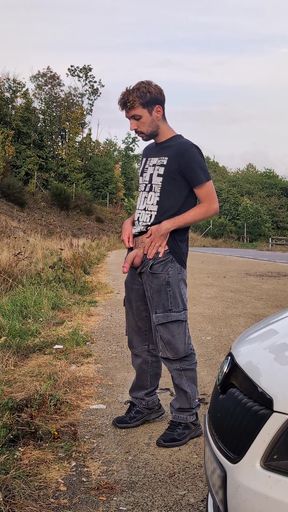 Guy Piss And Cum Near The Highway