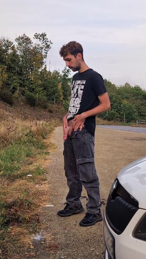 Guy Piss And Cum Near The Highway