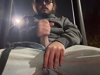 Horned up guy jerking off at a park