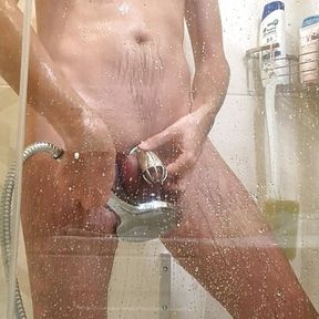 Taking shower while locked in chastity cage