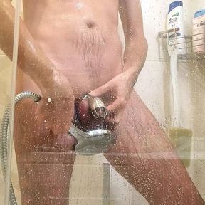 Taking shower while locked in chastity cage