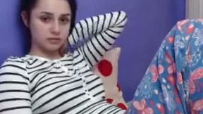 She might seem like a shy teen but she has no problem getting naked on cam