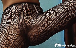 Asian stepmom knows how to tease in pantyhose