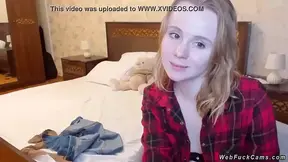 Petite blonde webcam babe shows off in black bra and red shirt