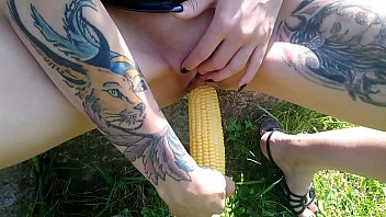 Lucy Ravenblood's juicy pussy gets fucked with corn in public