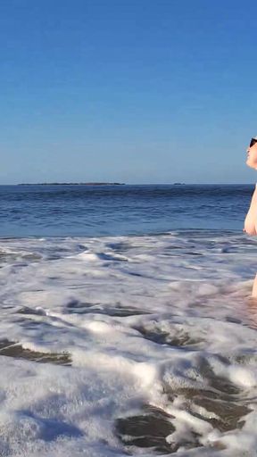 Real nudist Playing Naked in the Ocean Waves   Clip 1