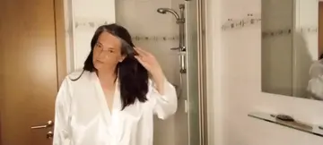 Fat German MILF gives steamy shower