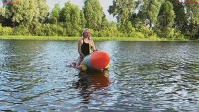 Alla hotly fucks a big inflatable rocket on the lake