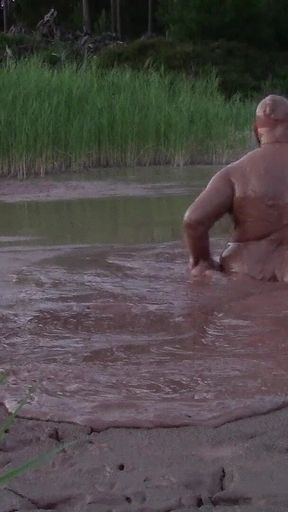 Mud Bath in Deep Quarry Mud Pond