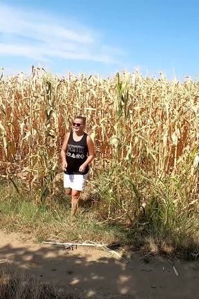 Pee in a corn field and wet her skirt