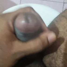 Indian black guy musterbation in toilet