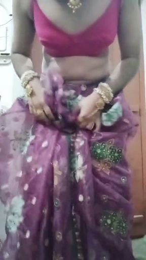 Indian Gay Crossdresser Bottom Gaurisissy pressing and playing with her big boobs in purple saree
