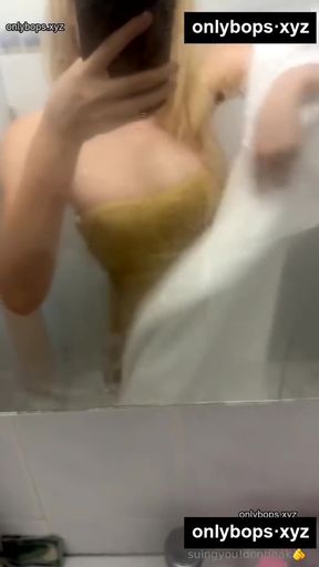 Blonde woman in yellow dress