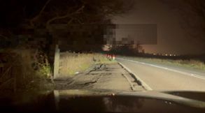 Crazy naked exhibition barefoot with cars passing close