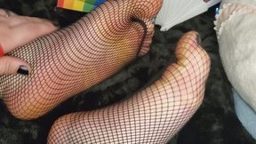 rubbing trans feet in fishnets