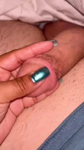 Latina plays with dick under the blankets