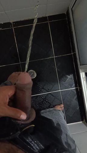 Urinating in Dark Jeans