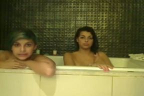 Two mesmerizing emo babes expose their gorgeous bums in the bathroom