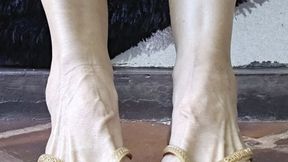 Flip Flops and highly arched feet show by Milah