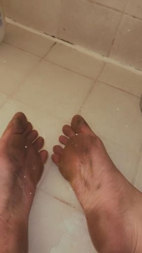 Cleaning my dirty feet off!