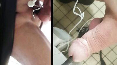 Electro-stimulation with big ball rod seen from above in zoom POV with ejaculation on camera